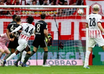 Bundesliga leaders Bayern Munich, without injured striker Harry Kane, fought back from two goals down to clinch an incredible victory over Freiburg thanks to Lennart Karl's 99th-minute winner.