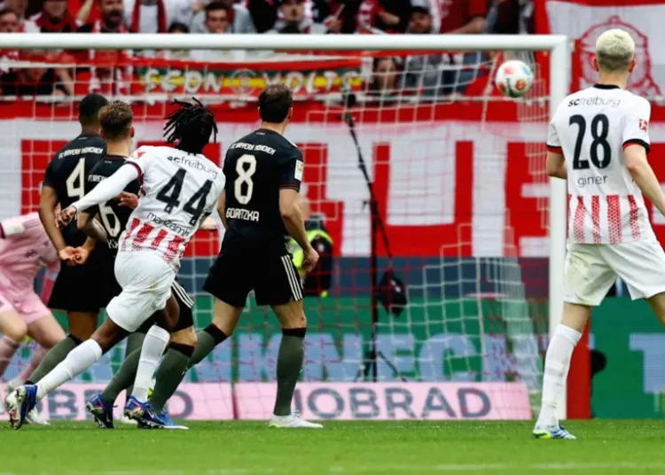 Bundesliga leaders Bayern Munich, without injured striker Harry Kane, fought back from two goals down to clinch an incredible victory over Freiburg thanks to Lennart Karl's 99th-minute winner.